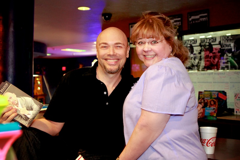 Bryant and Patrika raffling off Voice of Reason at the Balls of Fire Celebrity Bowling Tournament supporting Foothill Aids Project.